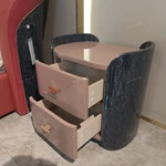 Curved High-Gloss Nightstand with Textured Drawer Panels and Oval Pulls